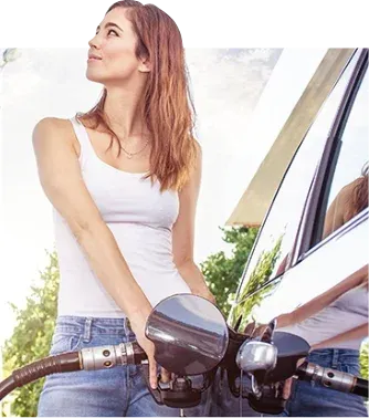 A customer paying at the pump